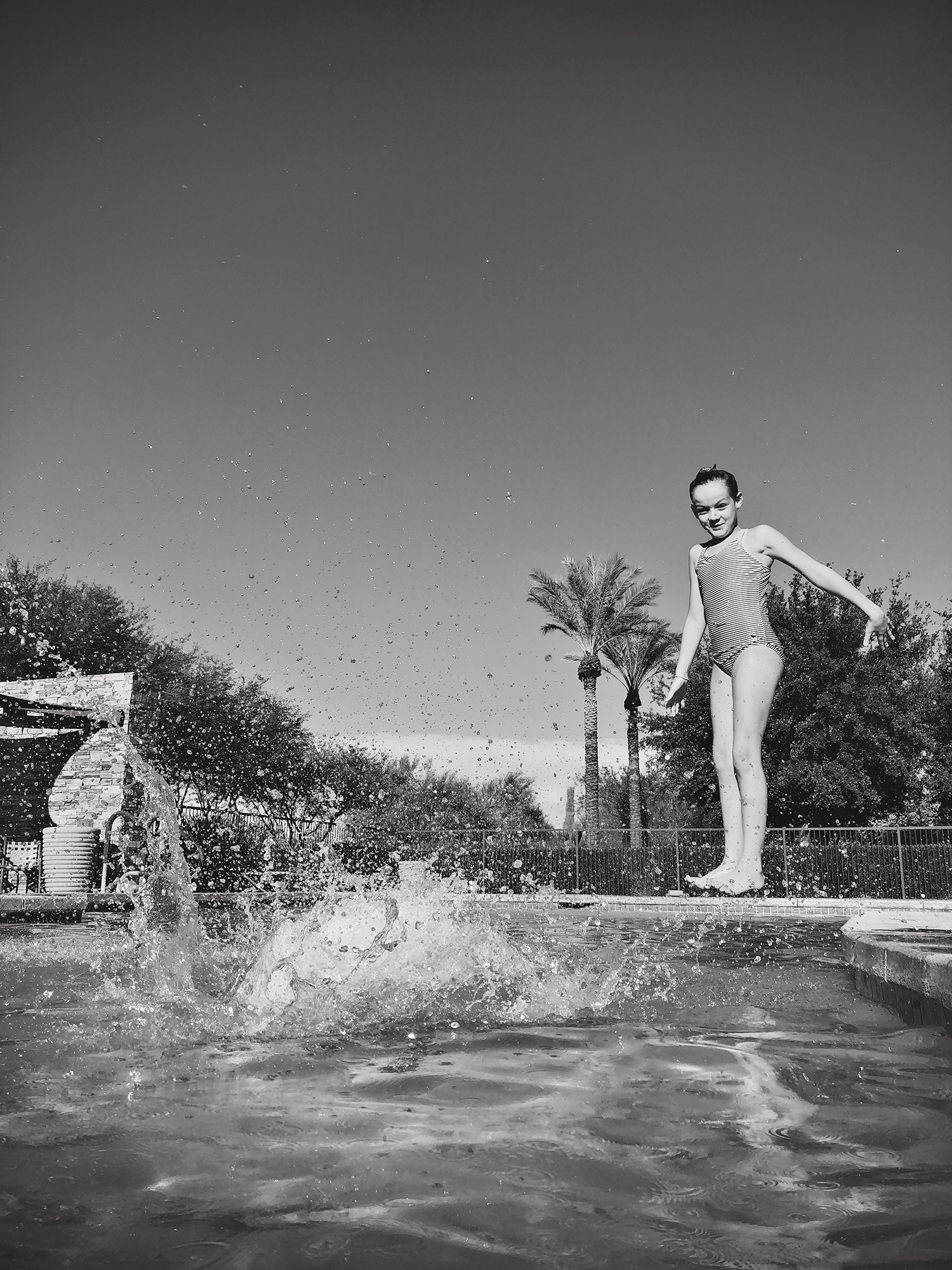 Pool days in the Arizona desert. A black and white collection of beating the triple degree heat and enjoying time with as a family. Desert living during the summer months at it's finest! #BlackAndWhitePhotography #Arizona #Phoenix #Poolside