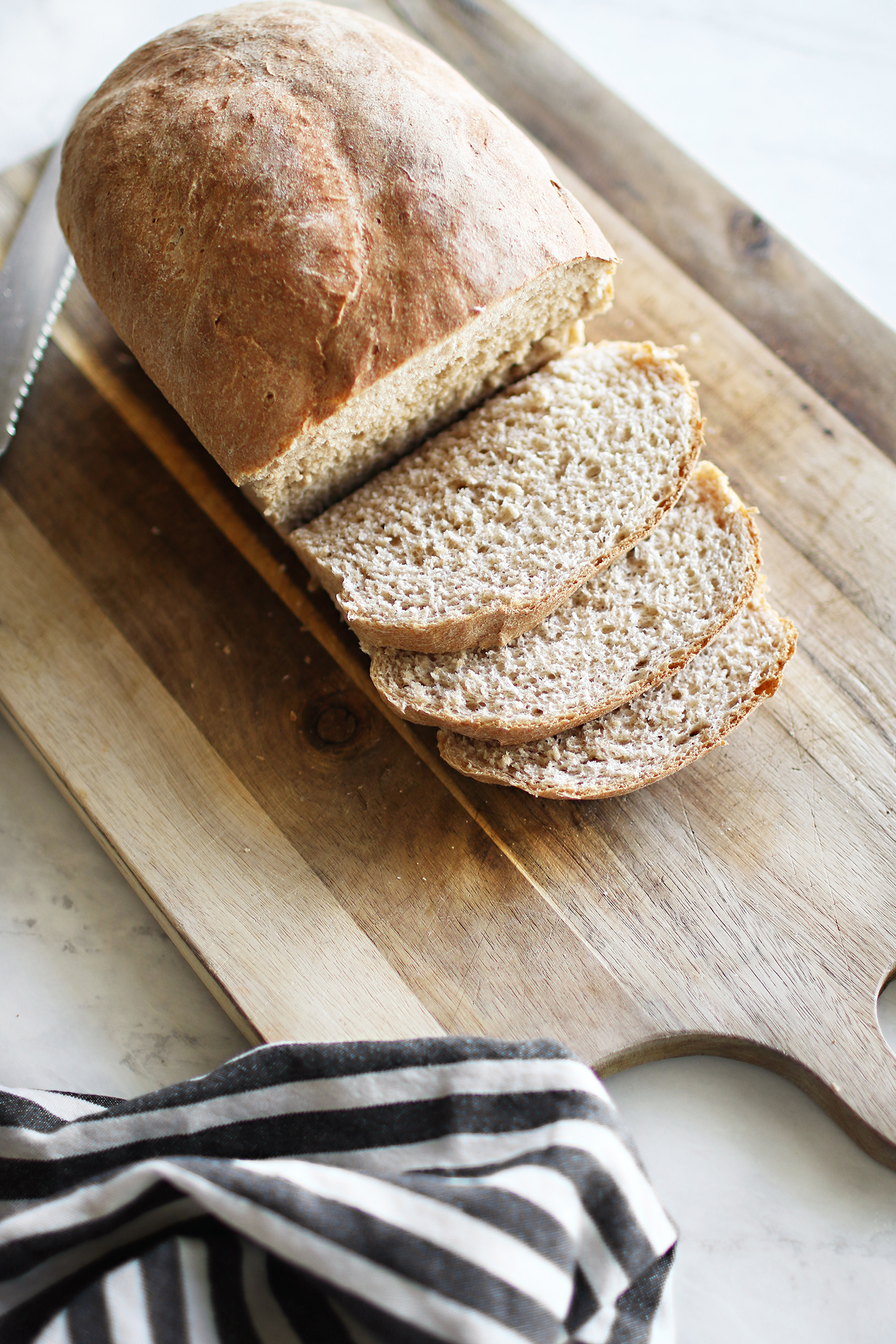 Sharing my recipe for delicious and homemade honey whole wheat bread. Get it now over on KaraLayne.com! #HomemadeBread #EasyHomemadeBread #HomemadeBreadRecipe #HoneyWholeWheatBread #HowToMakeHomemadeBread #Recipe #Baking