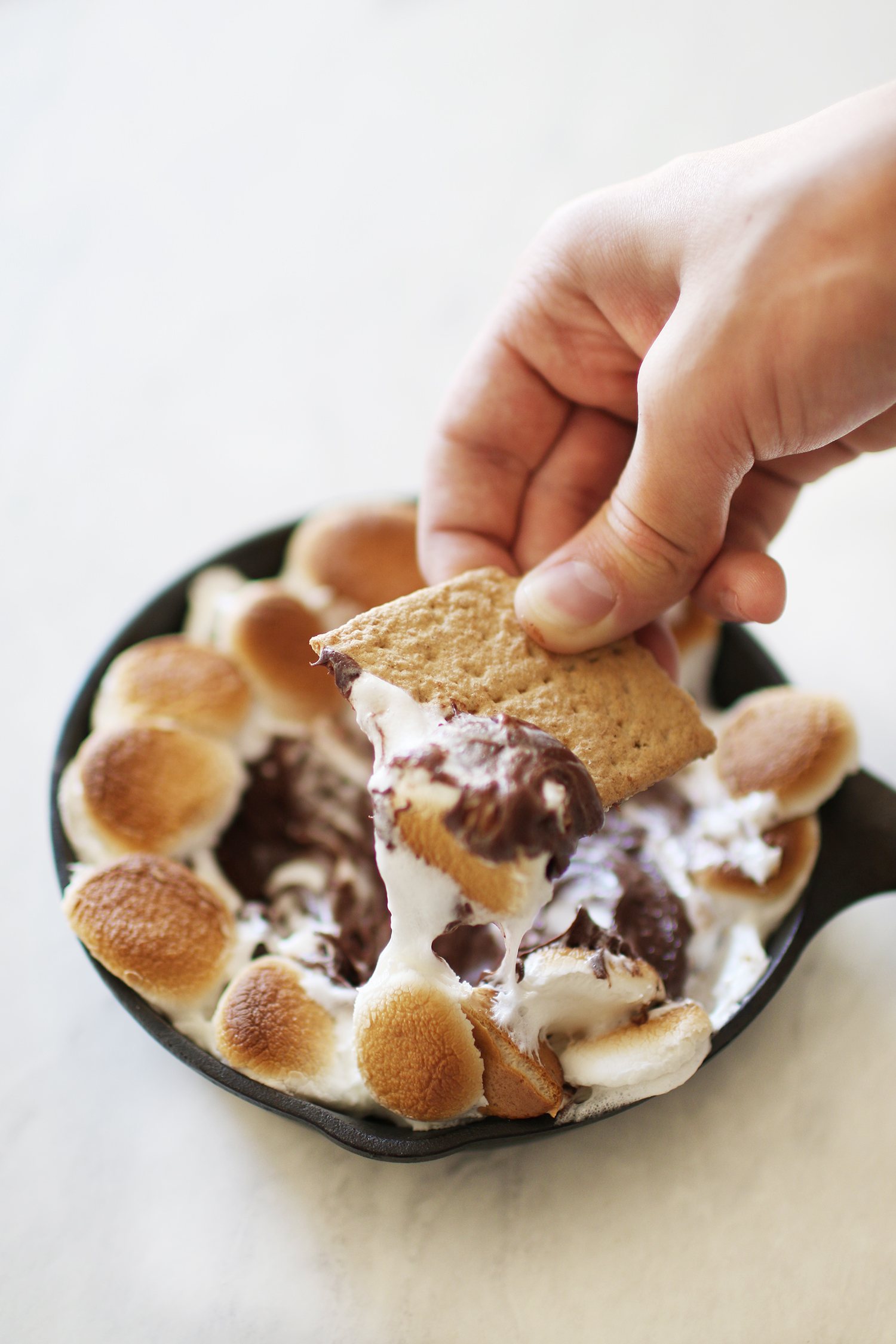 Quick and easy s'mores dip recipe on KaraLayne.com! The perfect dessert option for those cozy nights at home with the family! #DessertIdeas #EasyDessertIdeas #SmoresRecipe #SmoresDipRecipe