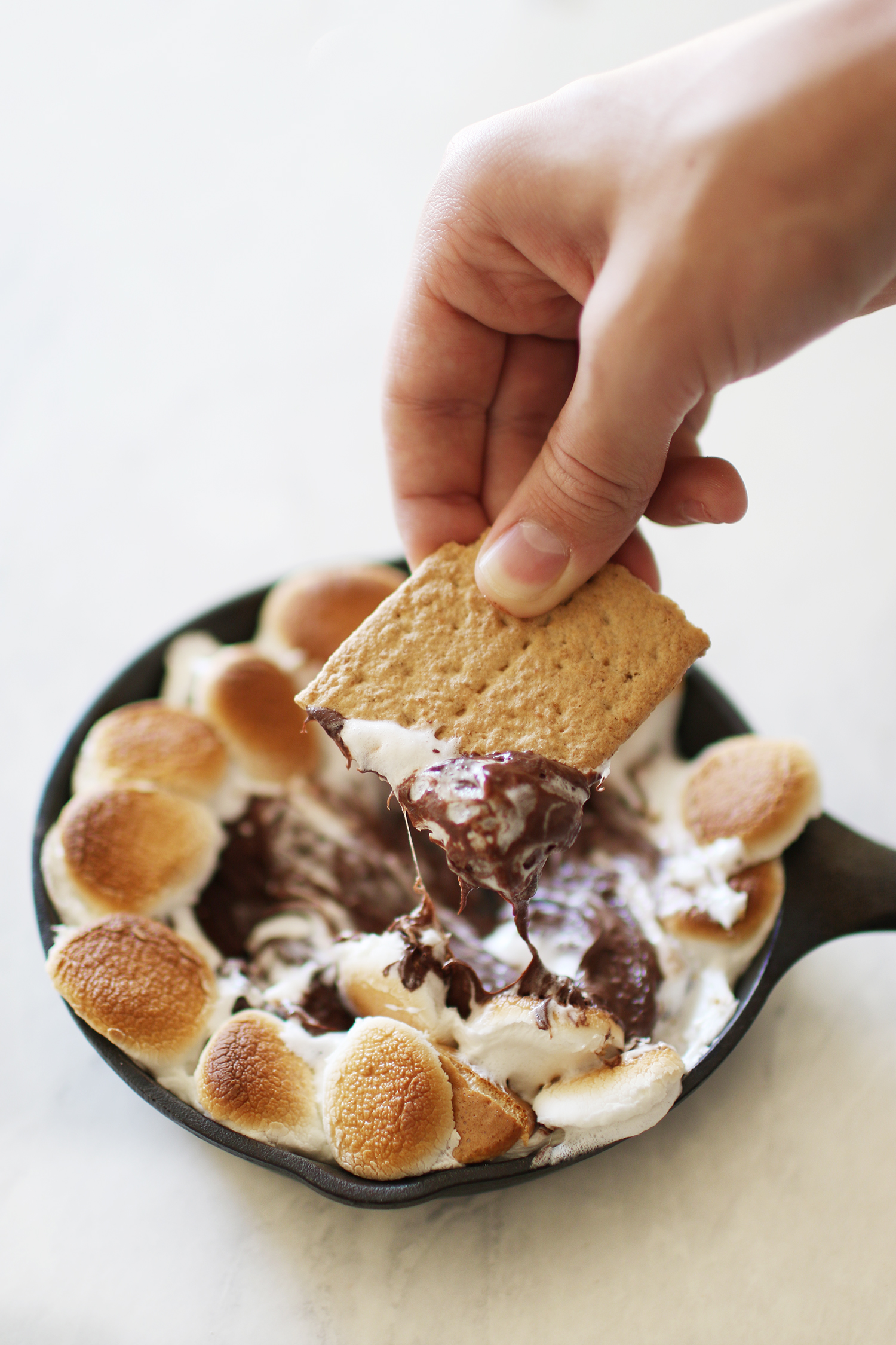 Quick and easy s'mores dip recipe on KaraLayne.com! The perfect dessert option for those cozy nights at home with the family! #DessertIdeas #EasyDessertIdeas #SmoresRecipe #SmoresDipRecipe