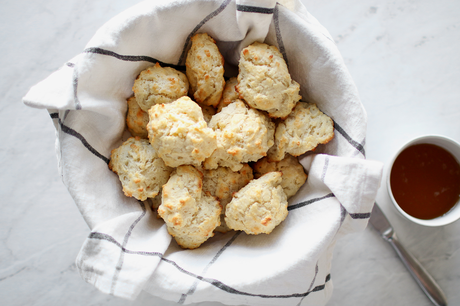 Easy and delicious four ingredient southern drop biscuits. You will love these especially since they are so quick and easy! Catch the recipe over at KaraLayne.com! 