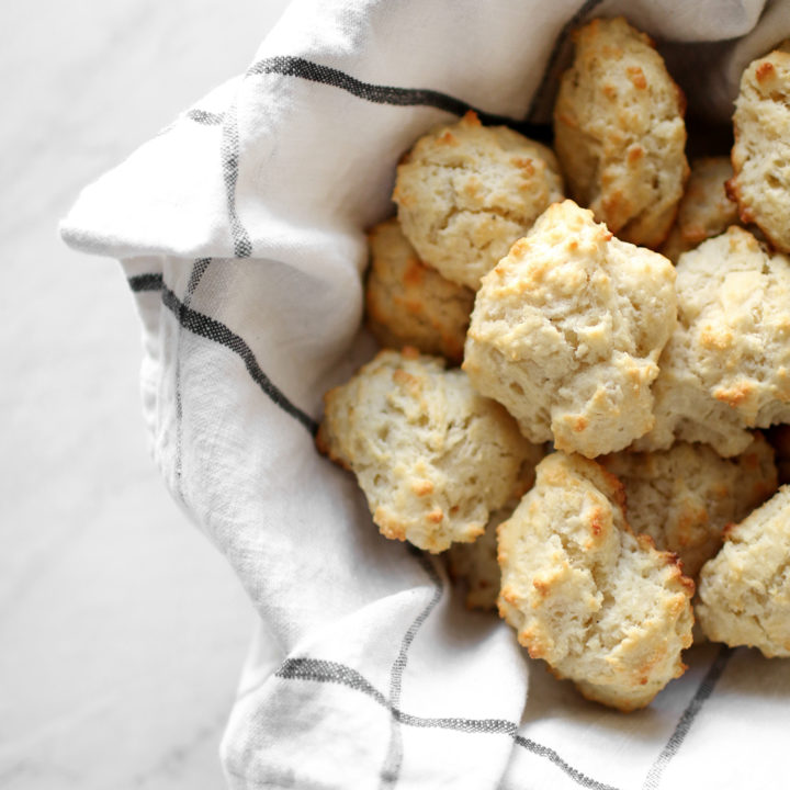 Easy and delicious four ingredient southern drop biscuits. You will love these especially since they are so quick and easy! Catch the recipe over at KaraLayne.com!