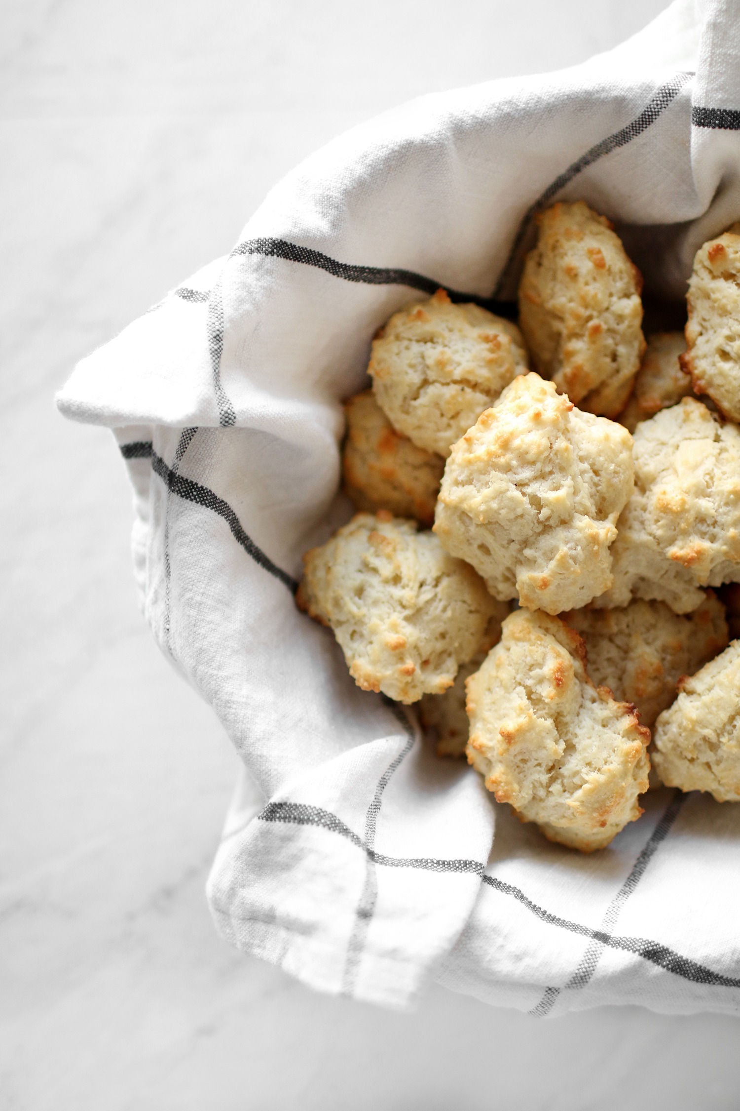 Easy and delicious four ingredient southern drop biscuits. You will love these especially since they are so quick and easy! Catch the recipe over at KaraLayne.com!