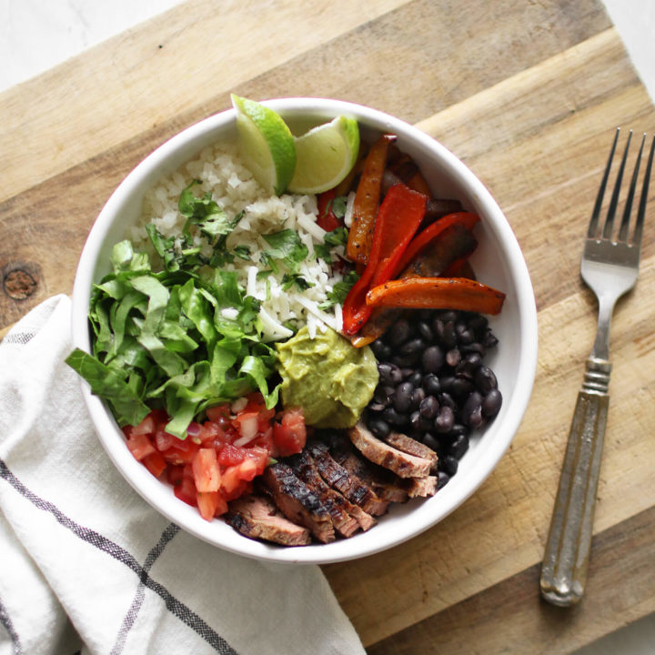 A gluten-free steak burrito bowl recipe that also happens to be low carb! A healthy and delicious weeknight meal for the family, perfect for the hot summer months! Catch the entire recipe and walk-through over on KaraLayne.com!