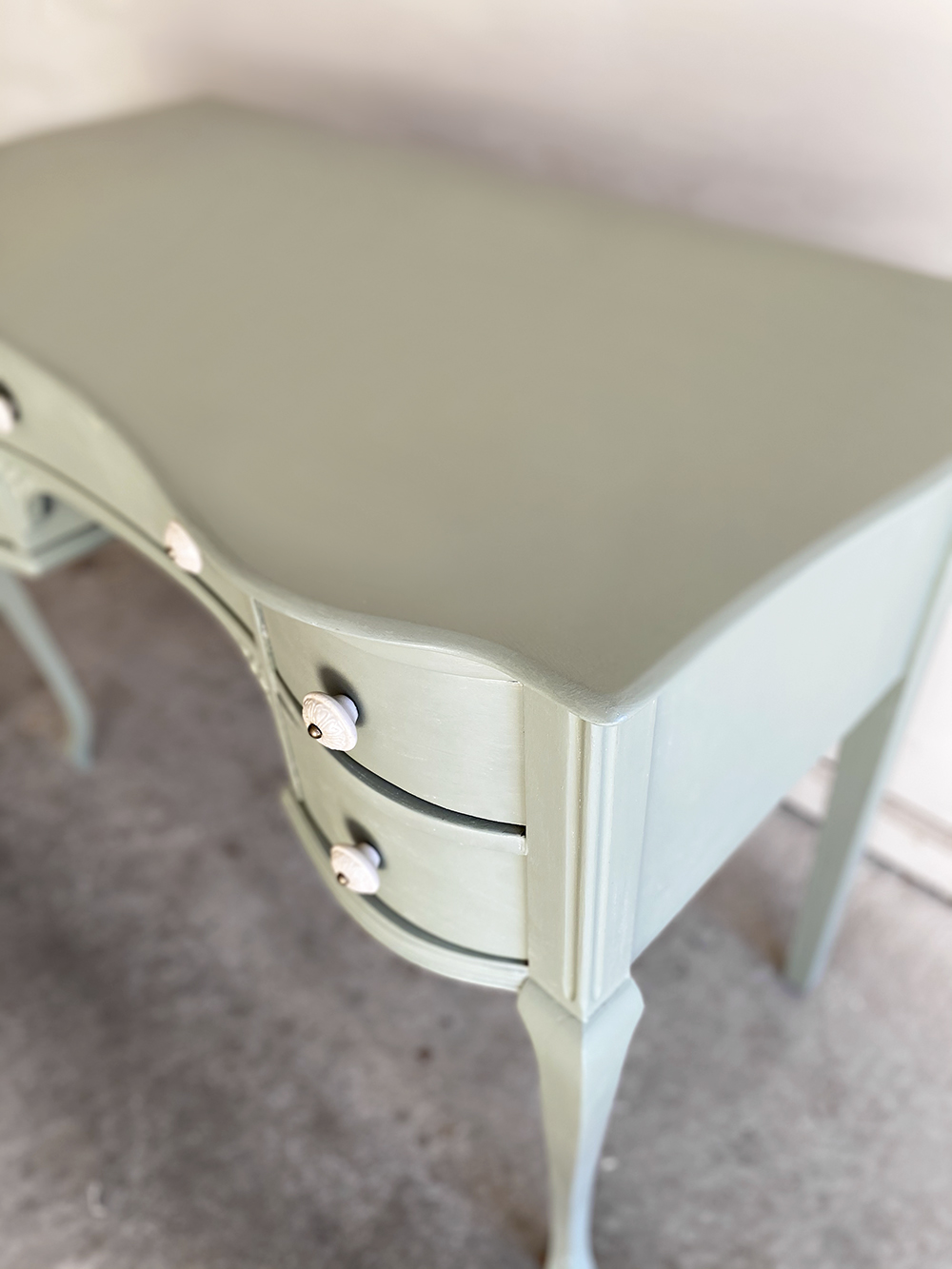 Sharing a peek into an upcycled antique DIY desk using milk paint that will be going in the girls' bedroom. Get a look at this ongoing project over at KaraLayne.com!