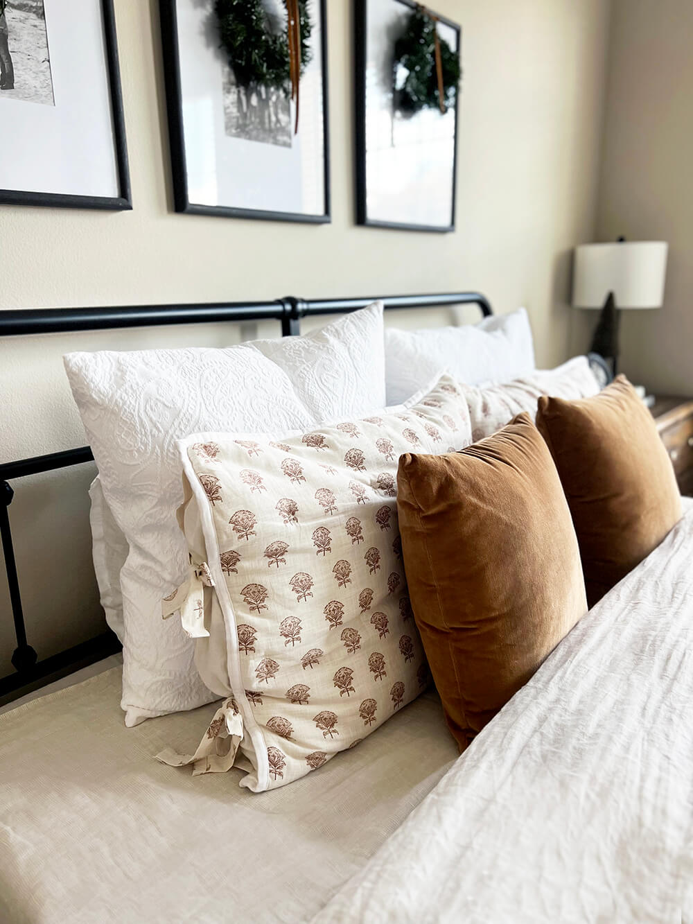 A simple and cozy modern cottage bedroom designed with classic touches and hints of the holiday season. I'm sharing a peek into this bedroom redo as well as a few simple ways you can create warm and inviting space perfect for the winter season. Dive in at KaraLayne.com!